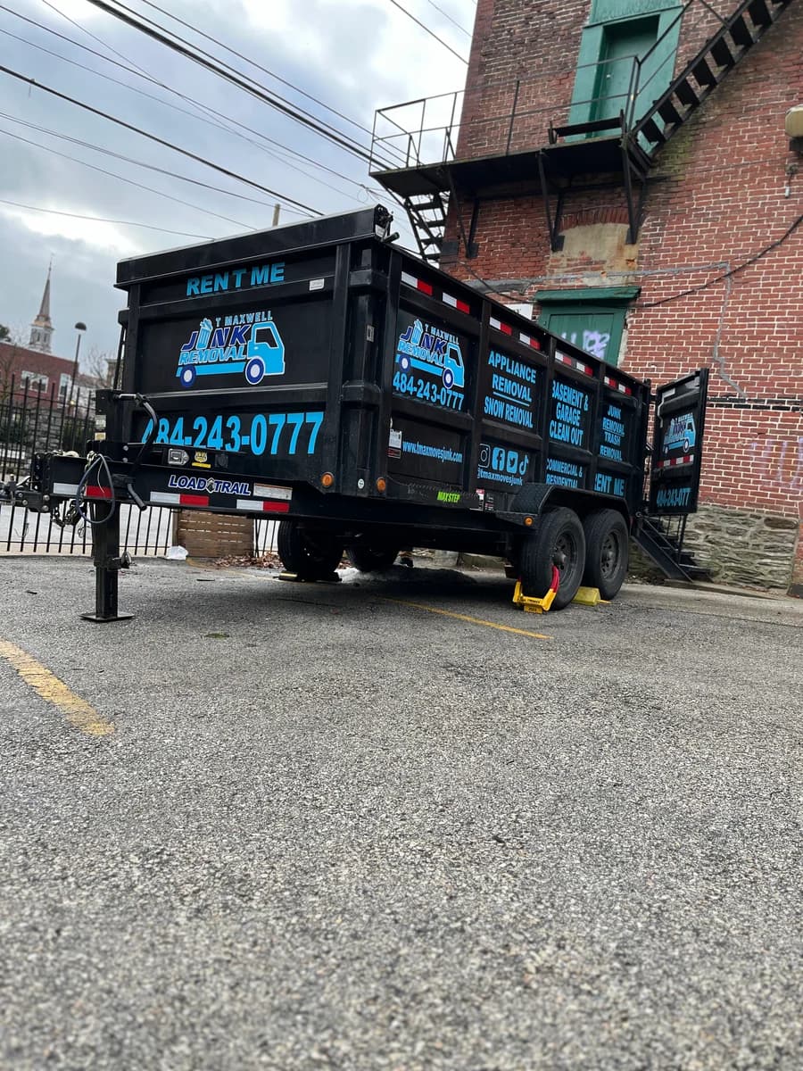 T Maxwell branded trailer on a Delaware County cleanout job