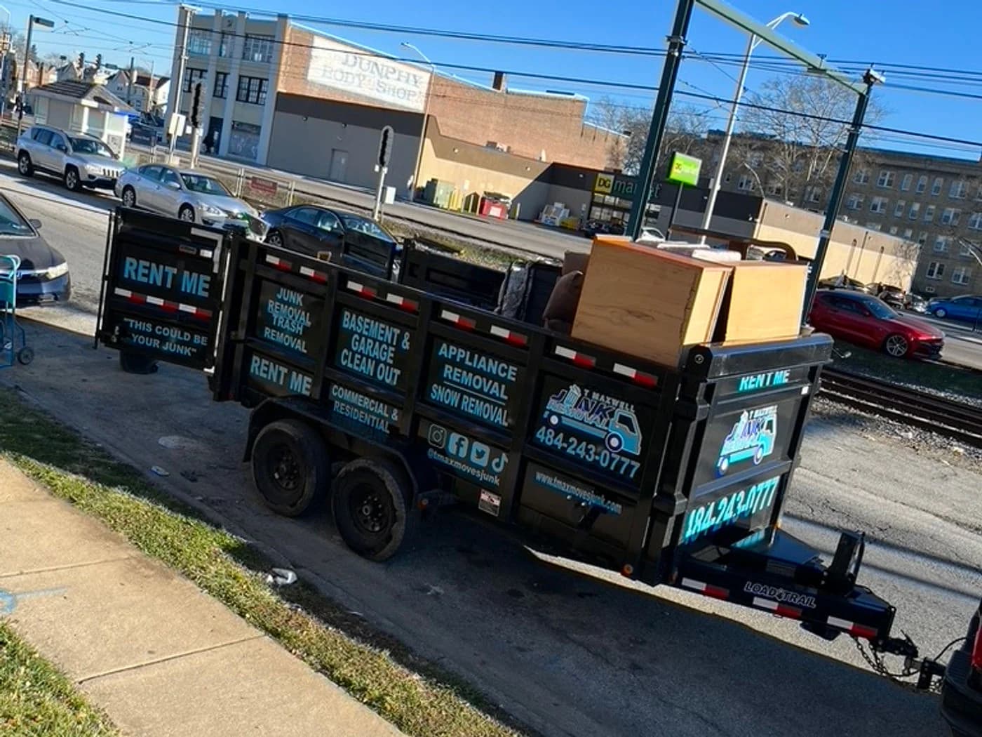 T Maxwell trailer loaded with furniture and debris from a Delaware County cleanout